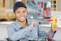portrait young male electrician using multi meter Royalty Free Stock Photo