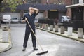 Portrait of young male street sweeper