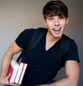 Portrait of a young male student with books Royalty Free Stock Photo