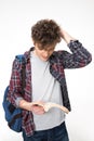 Portrait of a young male student reading book Royalty Free Stock Photo