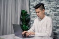 Portrait of young man businessman working  at  office with laptop on desk Royalty Free Stock Photo