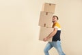 Portrait of young man carrying carton boxes Royalty Free Stock Photo