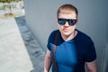 Portrait of young man in casual clothes and with sunglasses. Royalty Free Stock Photo