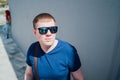 Portrait of young man in casual clothes and with sunglasses. Royalty Free Stock Photo