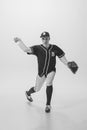 Portrait of young man, college student, baseball player, pitcher training, serving ball. black and white photography Royalty Free Stock Photo