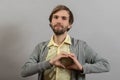 Portrait of young man doing heart gesture Royalty Free Stock Photo