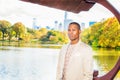 Young African American Man traveling in Central Park, New York Royalty Free Stock Photo