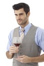 Portrait of young man with glass of wine Royalty Free Stock Photo