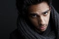 Portrait of a young man with gray wool scarf Royalty Free Stock Photo