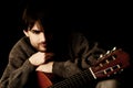 Portrait of young man with guitar Royalty Free Stock Photo