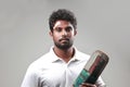 Portrait of a young man holding bat  with a bruised forehead Royalty Free Stock Photo