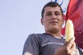 A Portrait of Young man Holding A Sweet Corns in Hand