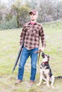 Portrait of Young Man Hunting With Dog Royalty Free Stock Photo