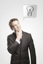 Portrait of a young man with light bulb