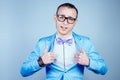 Portrait of a young man nerd gay with glasses, in a stylish suit and tie Royalty Free Stock Photo