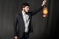 Portrait of a young man with oil lamp Royalty Free Stock Photo