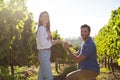 Portrait of young man proposing girlfriend at vineyard Royalty Free Stock Photo