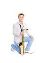 Portrait of a young man with a saxophone Royalty Free Stock Photo