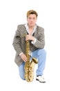 Portrait of a young man with a saxophone Royalty Free Stock Photo