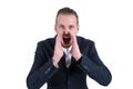 Portrait of a young man screaming out loud on a white background Royalty Free Stock Photo