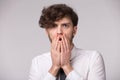 Portrait of young man with shocked emotional facial expression Royalty Free Stock Photo