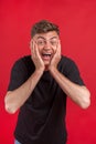 Portrait of young man with shocked facial expression Royalty Free Stock Photo