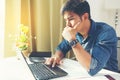 Portrait of young man sitting at his desk in the office Royalty Free Stock Photo