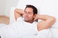 Portrait Of Young Man Sleeping On Bed Royalty Free Stock Photo