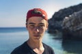 Young man standing in front of the ocean Royalty Free Stock Photo