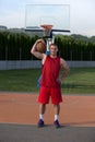 Portrait of young man street basket player Royalty Free Stock Photo