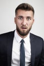 Portrait of young man with surprised look Royalty Free Stock Photo