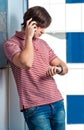 Portrait of a young man talking on phone