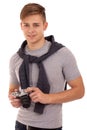 Portrait of young man with vintage camera Royalty Free Stock Photo