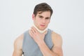 Portrait of a young man wearing cervical collar Royalty Free Stock Photo