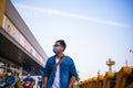 Portrait of young man wearing a protective mask, outside the supermarket