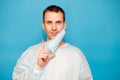 Portrait of young man wears protective mask and protective suit against air pollution or transmissible infectious diseases Royalty Free Stock Photo