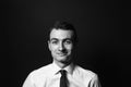 Portrait of a young man in a white shirt and black tie Royalty Free Stock Photo