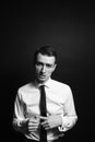 Portrait of a young man in a white shirt and black tie Royalty Free Stock Photo