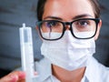 Portrait of a young medicine worker. Doctor woman headshot while standing in hospital office. Physician at workplace, portrait