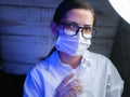 Portrait of a young medicine worker. Doctor woman headshot while standing in hospital office. Physician at workplace, portrait