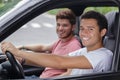 portrait young men in front seats car Royalty Free Stock Photo
