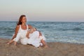 Portrait of a young mother and daughter on the seashore Royalty Free Stock Photo