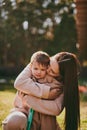 Portrait of young mother with her son. Happy motherhood, woman playing with boy Royalty Free Stock Photo