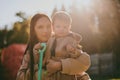 Portrait of young mother with her son. Happy motherhood, woman playing with boy Royalty Free Stock Photo