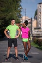 Portrait of young multietnic jogging couple ready to run