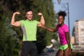 Portrait of young multietnic jogging couple ready to run