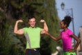 Portrait of young multietnic jogging couple ready to run