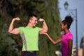 Portrait of young multietnic jogging couple ready to run