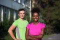 Portrait of young multietnic jogging couple ready to run