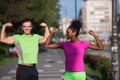 Portrait of young multietnic jogging couple ready to run